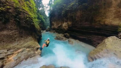 Cebu: Kawasan Falls Canyoneering Tour with Ziplining & Lunch - Canyoneering at Kawasan Falls: Trek, Slides, Swims, and Optional Jumps