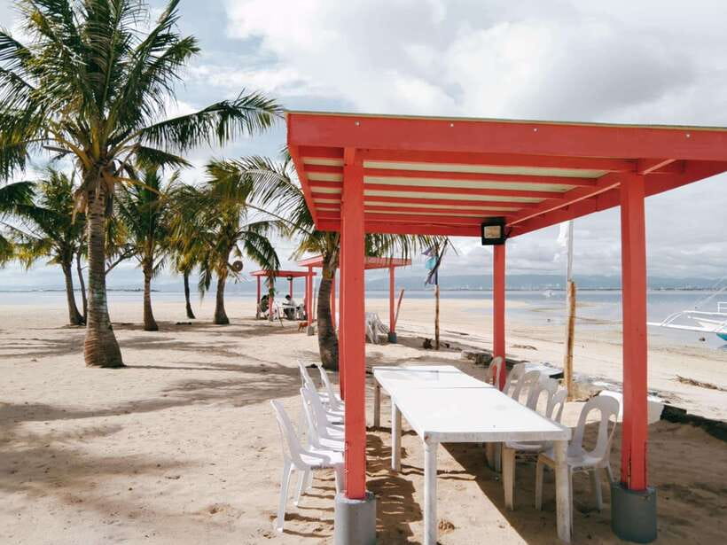 Cebu: Mactan Island Hopping Boat Tour with Lunch - Caohagan white-sand swim time: your reset between reef stops